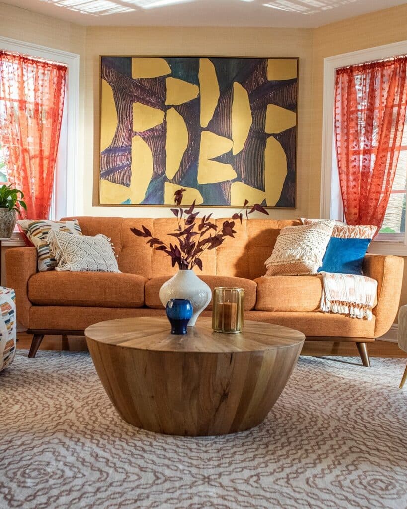 Artistic Mid-Century Orange Couch Focal Point