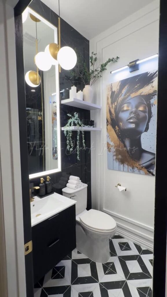 Bathroom with a Black Vanity and Geometric Floor