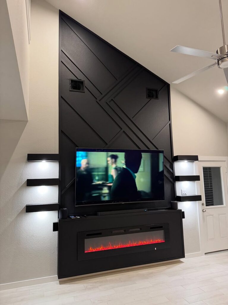 Black Apex TV Media Wall with Geometric Form