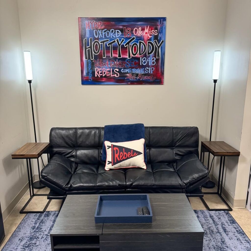 Black Futon in a Sporty Modern Lounge for Casual Functionality