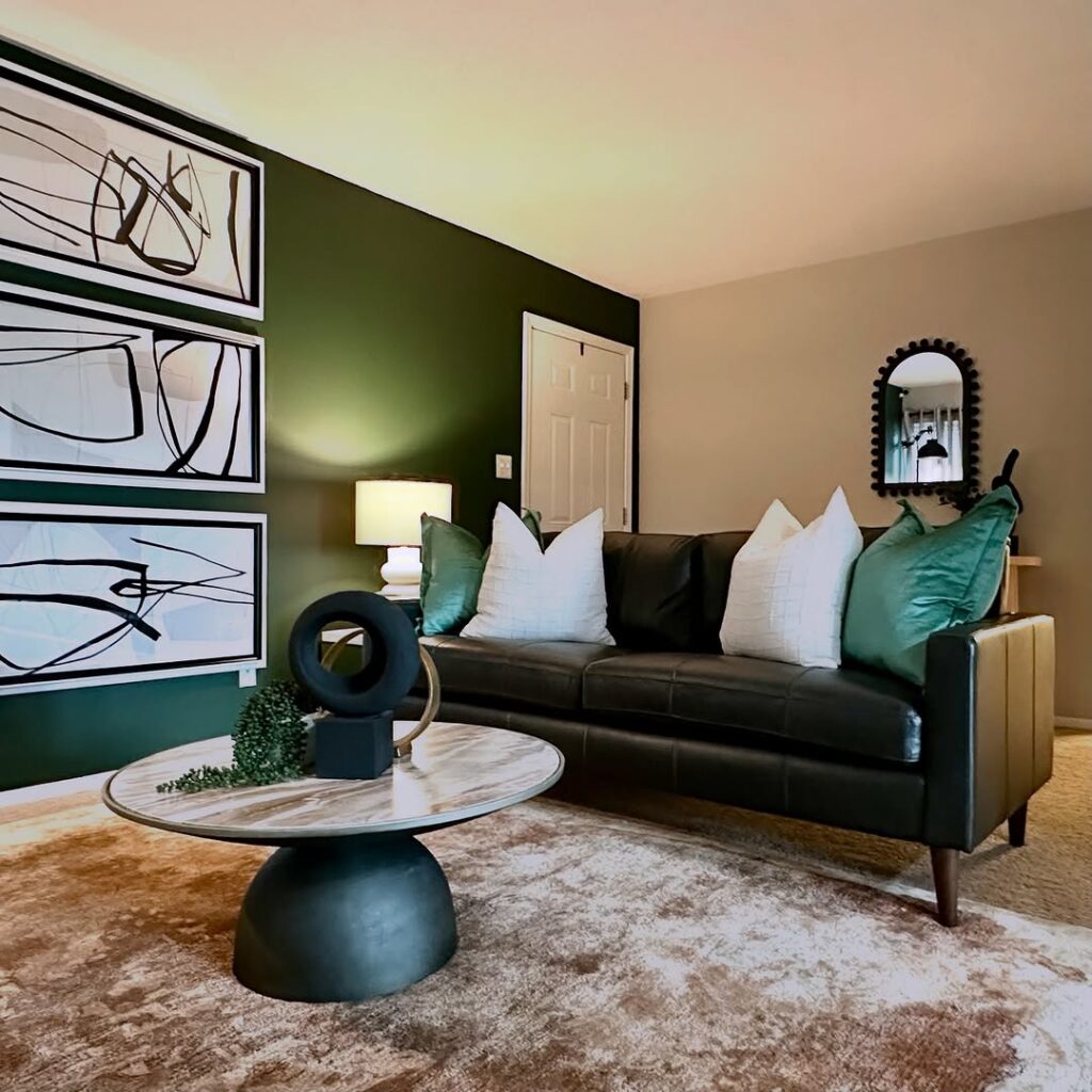 Black Sofa in a Green Room