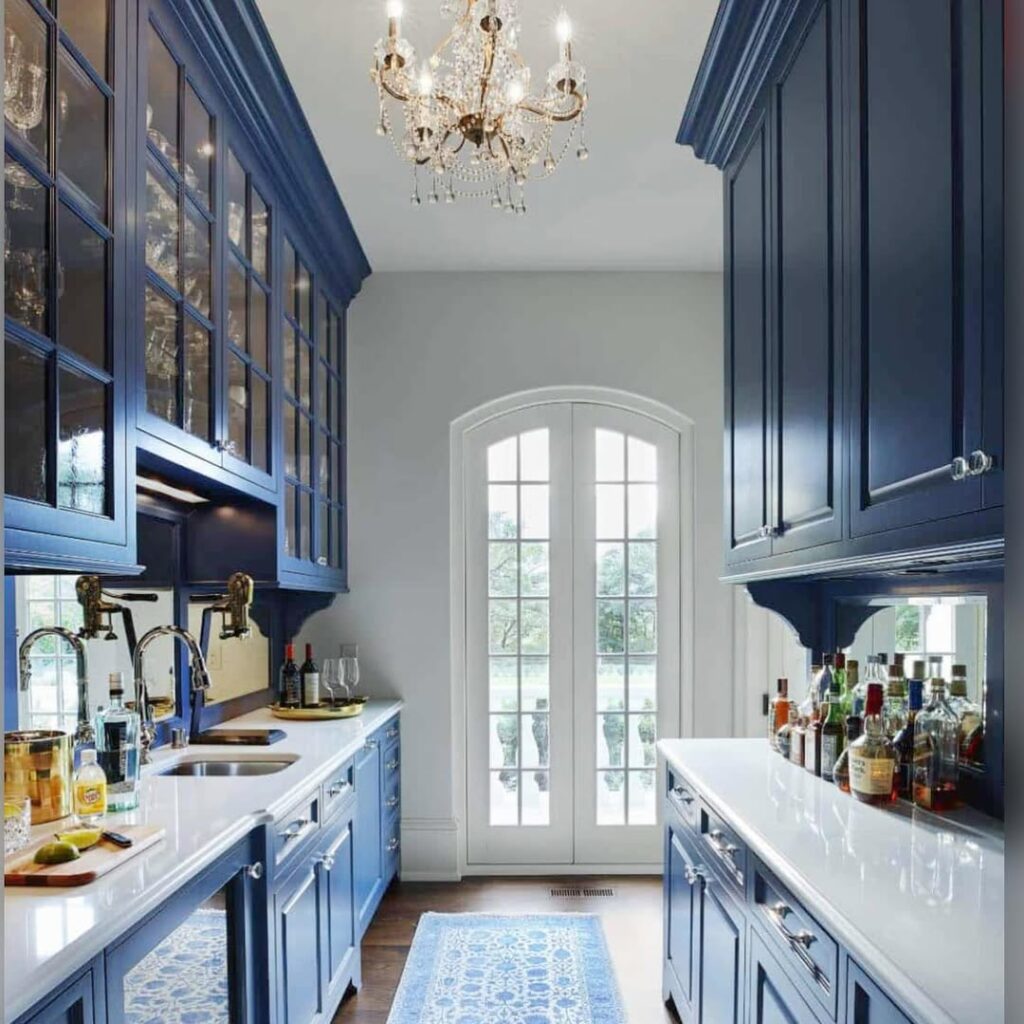 Blue French Country Kitchen With Chandelier