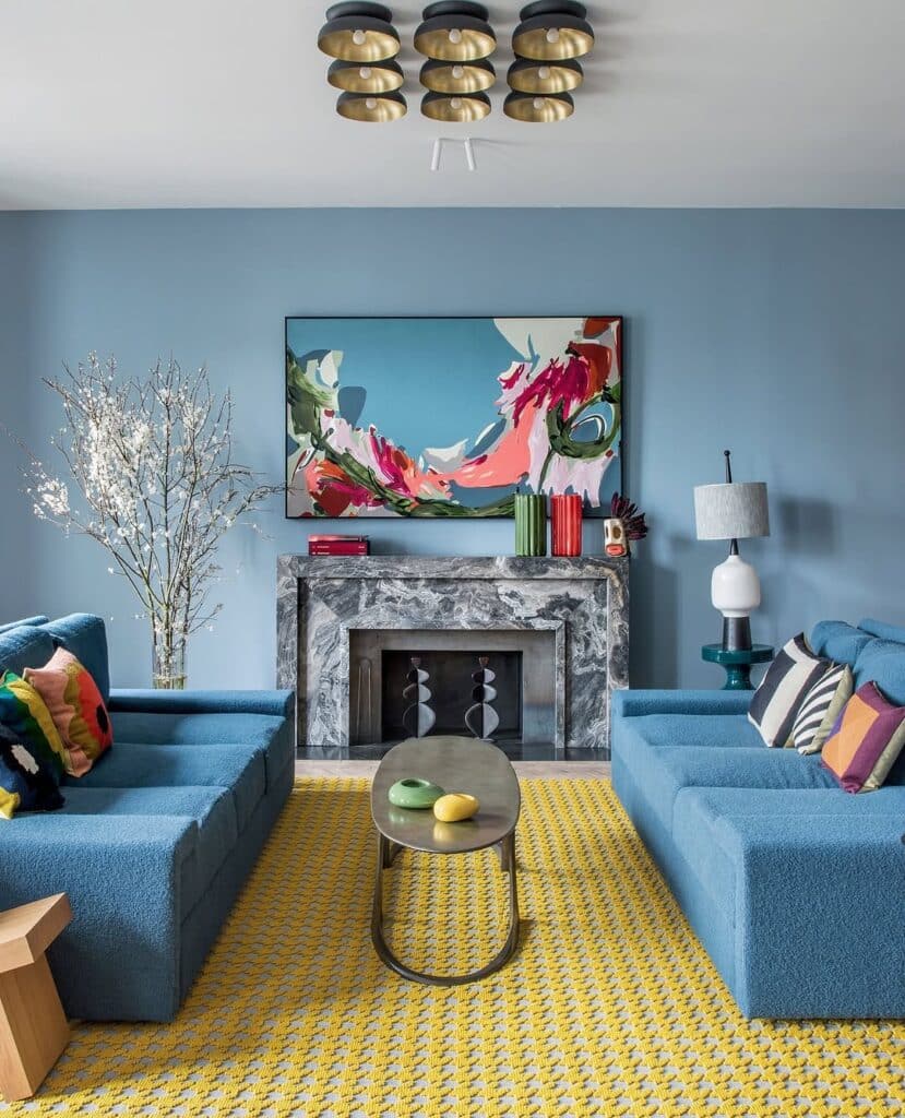 Blue Mid-Century Sofa and Bold Artwork