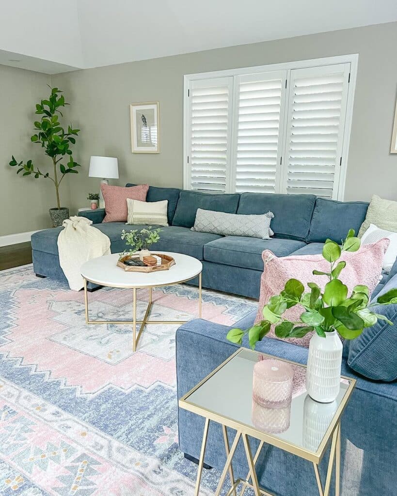 Blush Details on a Soft Teal Sectional