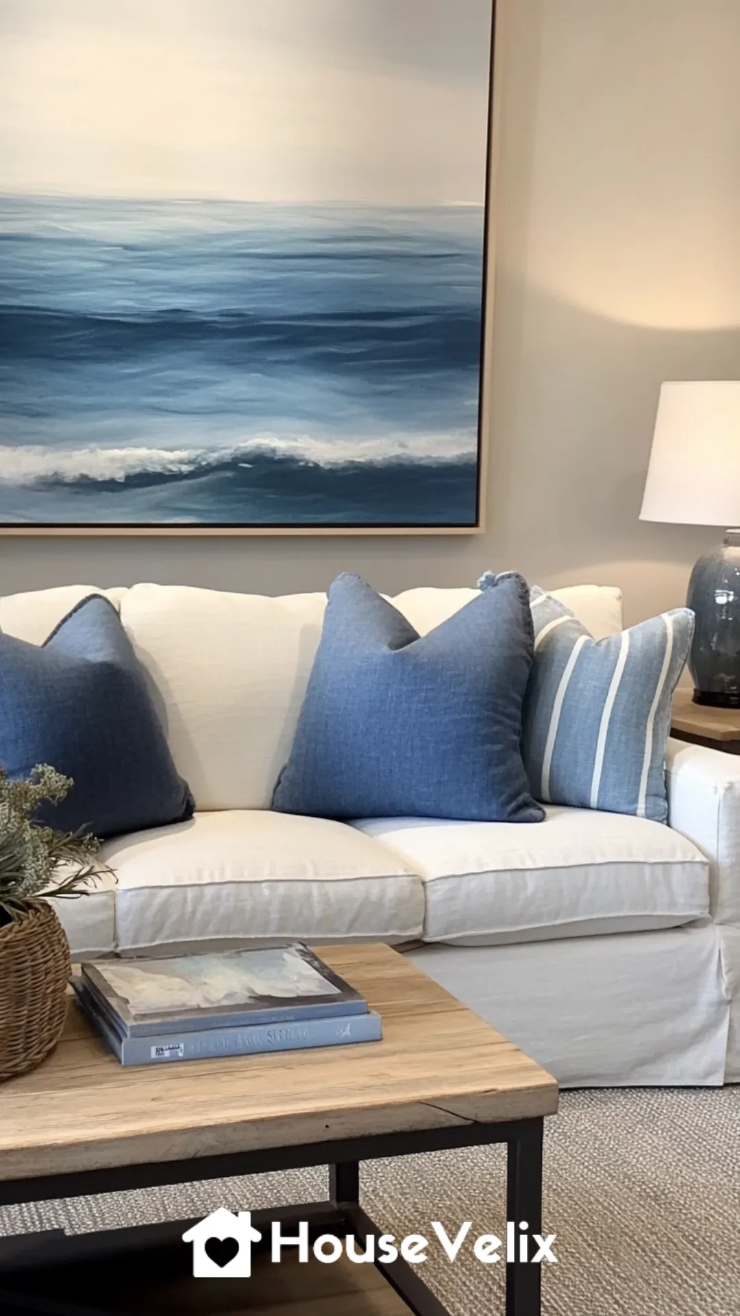 Light Linen Slipcovered Sofa with Coastal Blue Pillows