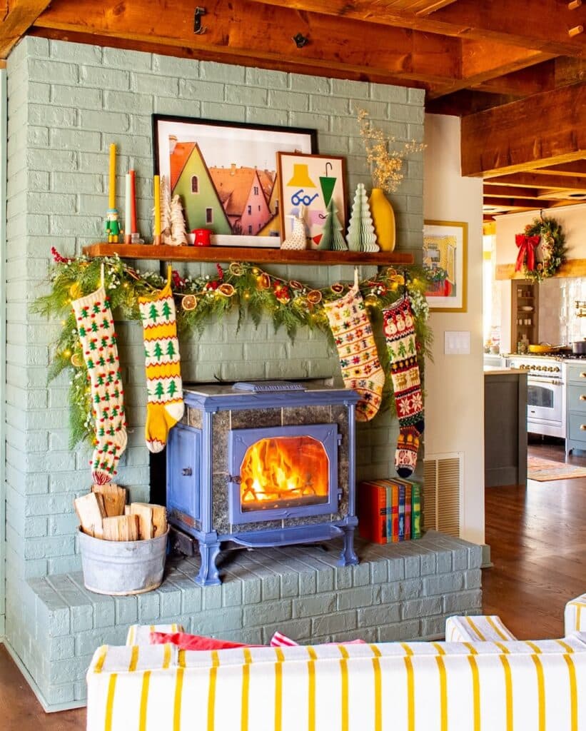 Color variation on a brick hearth with a festive mantel