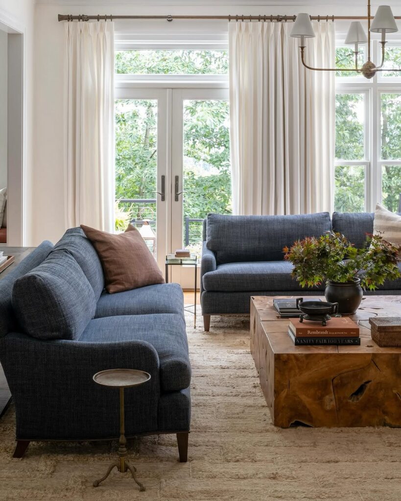 Deep Navy Sofa and Sheer Curtains