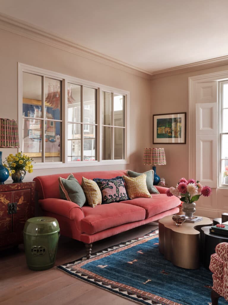 Eclectic Accents Paired with a Coral Red Sofa