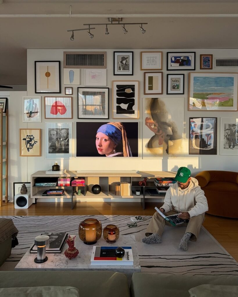 Eclectic Floor-to-Ceiling Gallery Wall in the Living Room