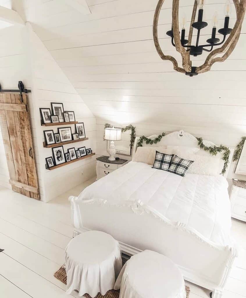 Farmhouse Bedroom With a Carved White Bed