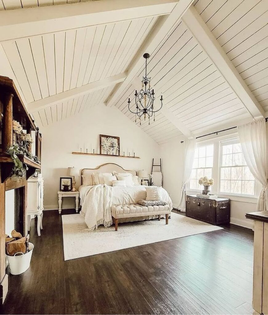 Farmhouse Bedroom With a Vaulted Ceiling