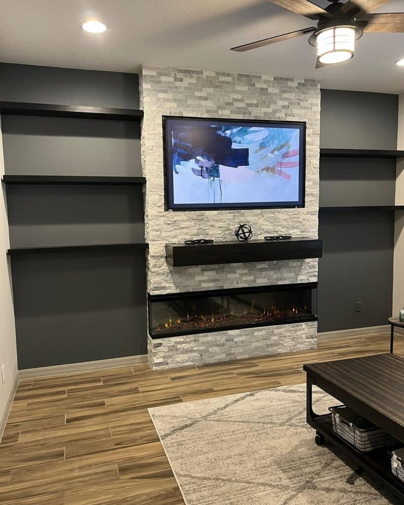 Fireplace Focal Point in a Textured Stone TV Wall