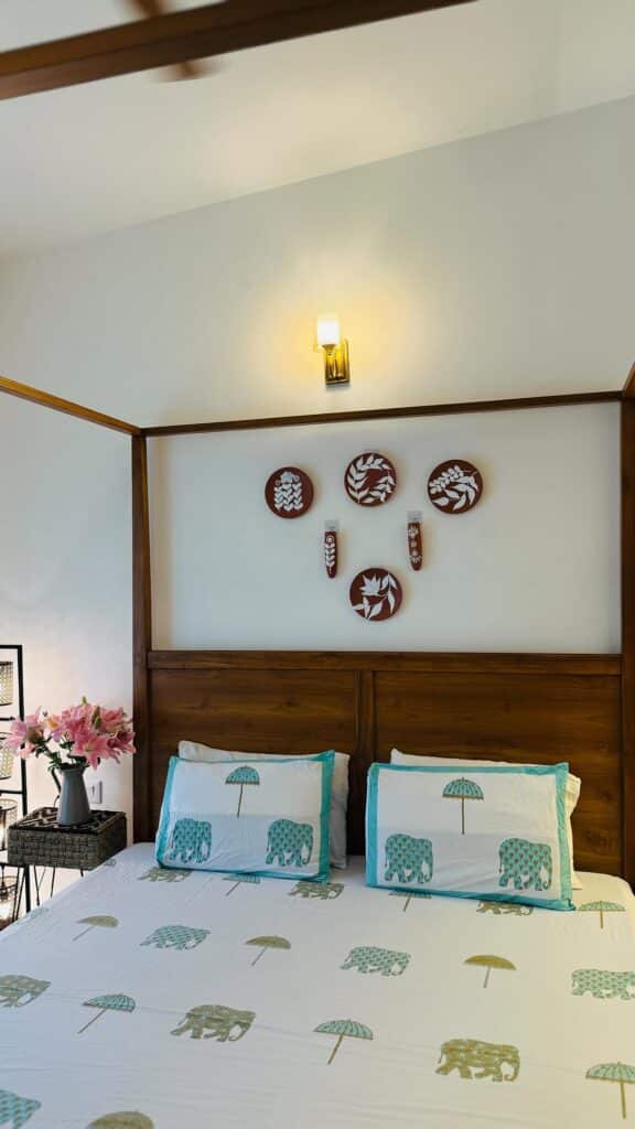 Folk Botanical Prints with a Teak Bed