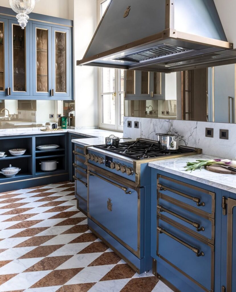 French Country Kitchen with Blue Cabinetry and Marble