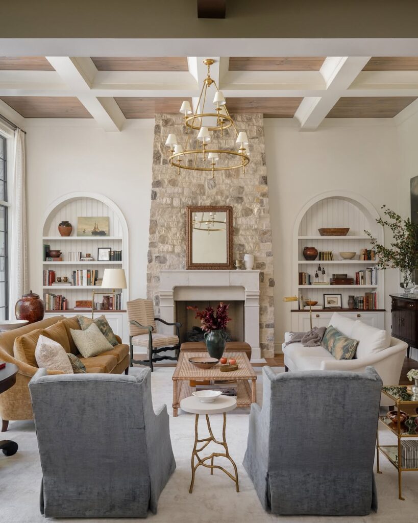 French Country Salon with Stone Hearth and Coffered Beams