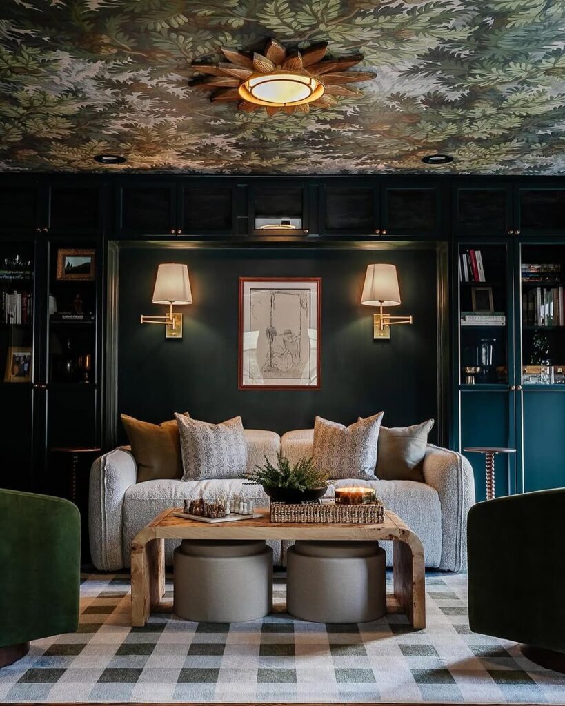 Green lounge beneath a patterned ceiling
