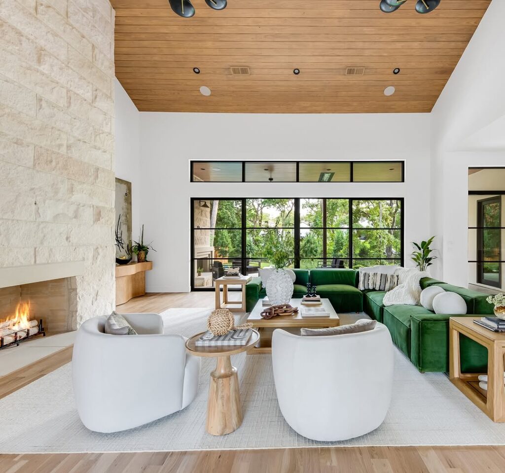 Green Sectional Room with Modern Organic Style and Wood Ceiling