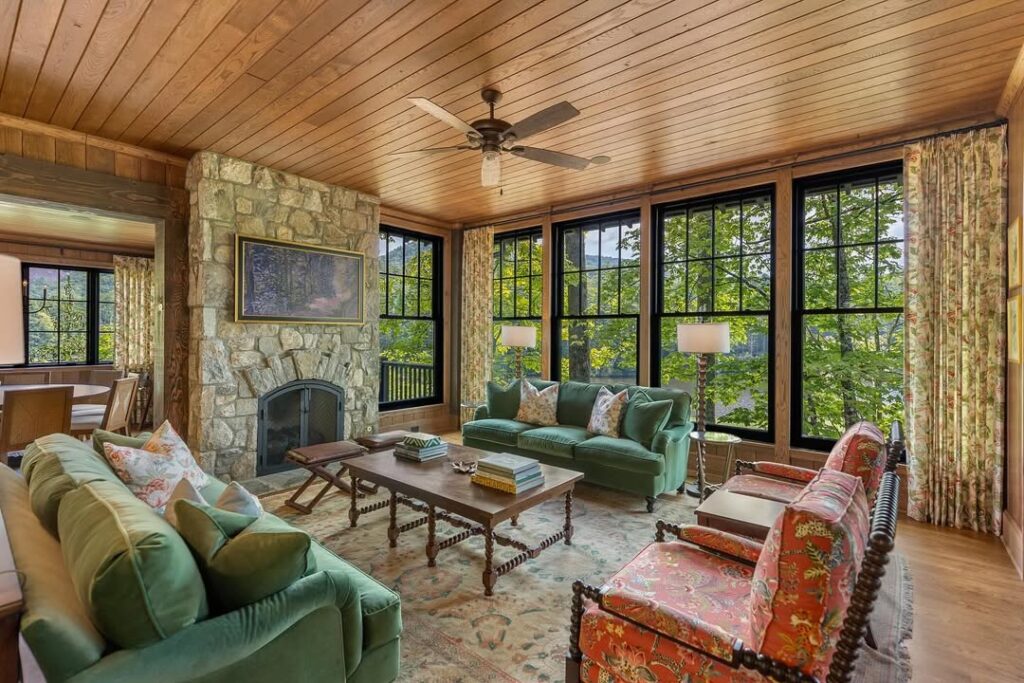 Lodge Lounge Framed by Wood and Outdoor Views