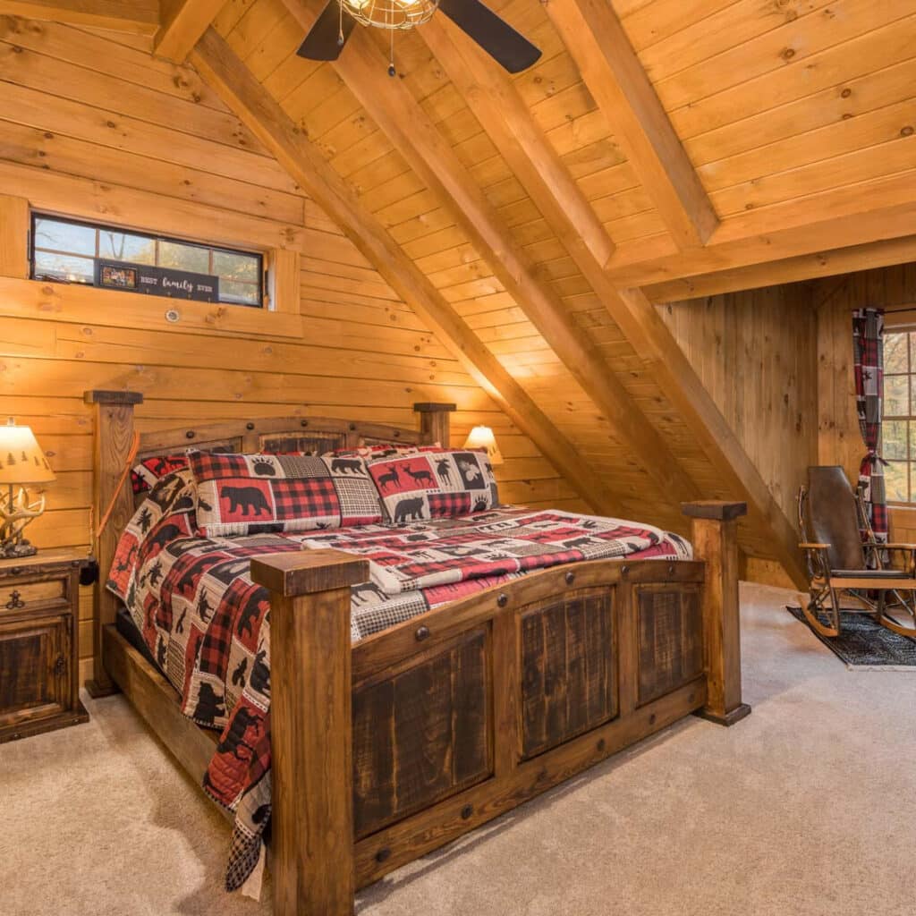 Loft Bedroom with Rustic Lodge Style and Cabin Quilt