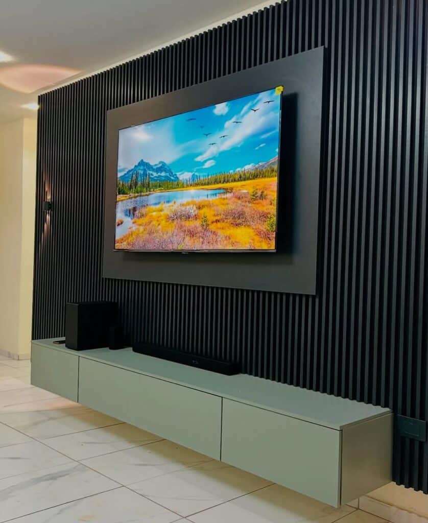 Matte Sage Stand and Black Slatted Wall