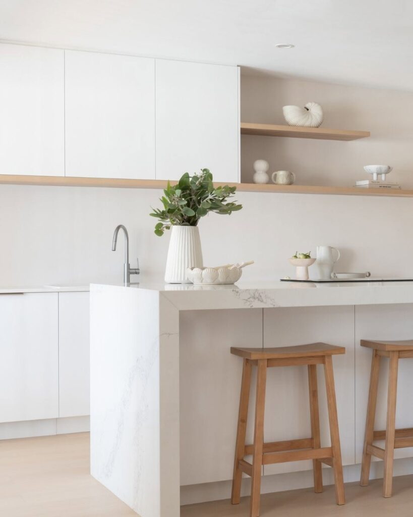 Minimal White Kitchen With Wood Accents