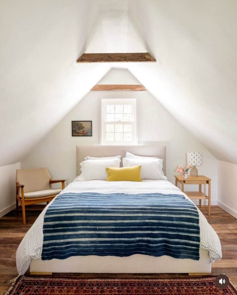 Minimalist Attic Bedroom With Exposed Beams