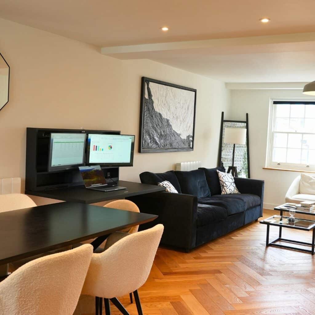 Modern Lounge Built Around a Black Sofa for Working at Home