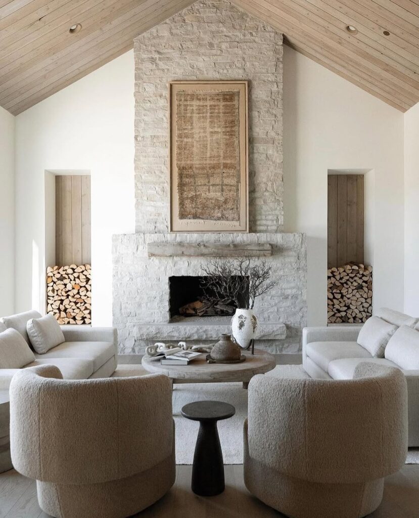 Modern organic living room with soft stone fireplace and organic seating