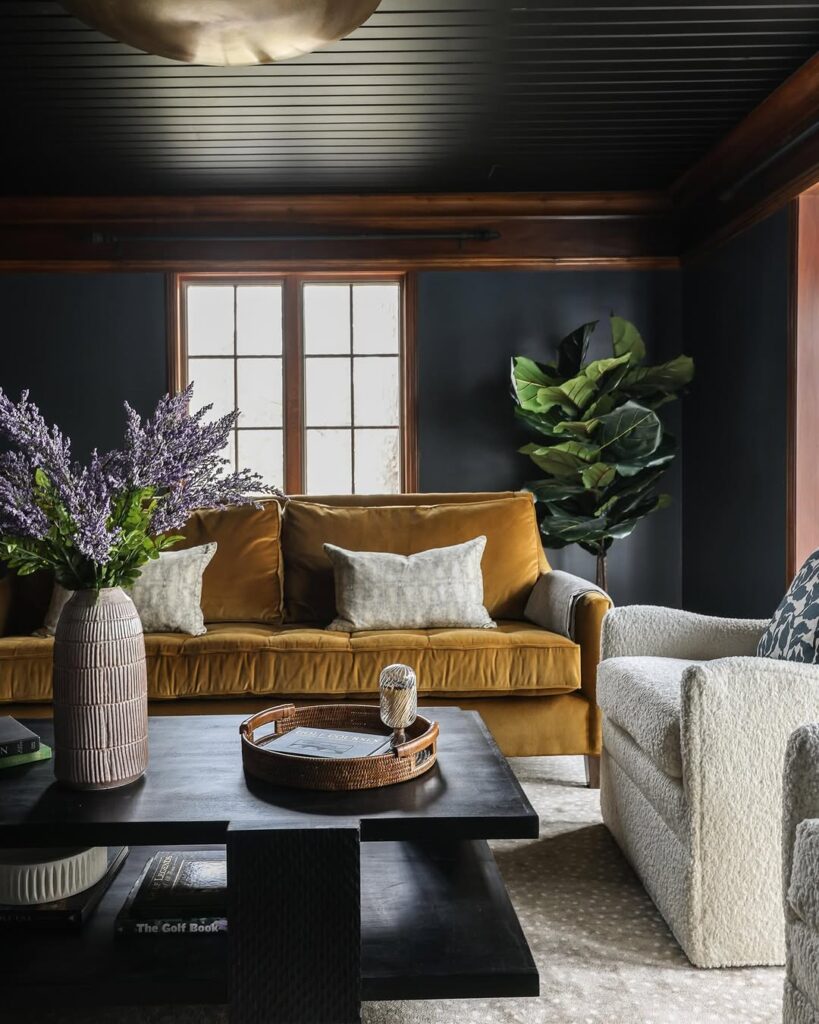 Mustard Velvet Seating in a Navy Lounge