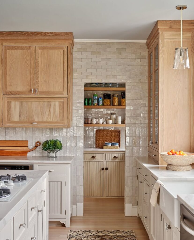 Neutral Kitchen with Creamy Tile and Warm Oak Cabinetry