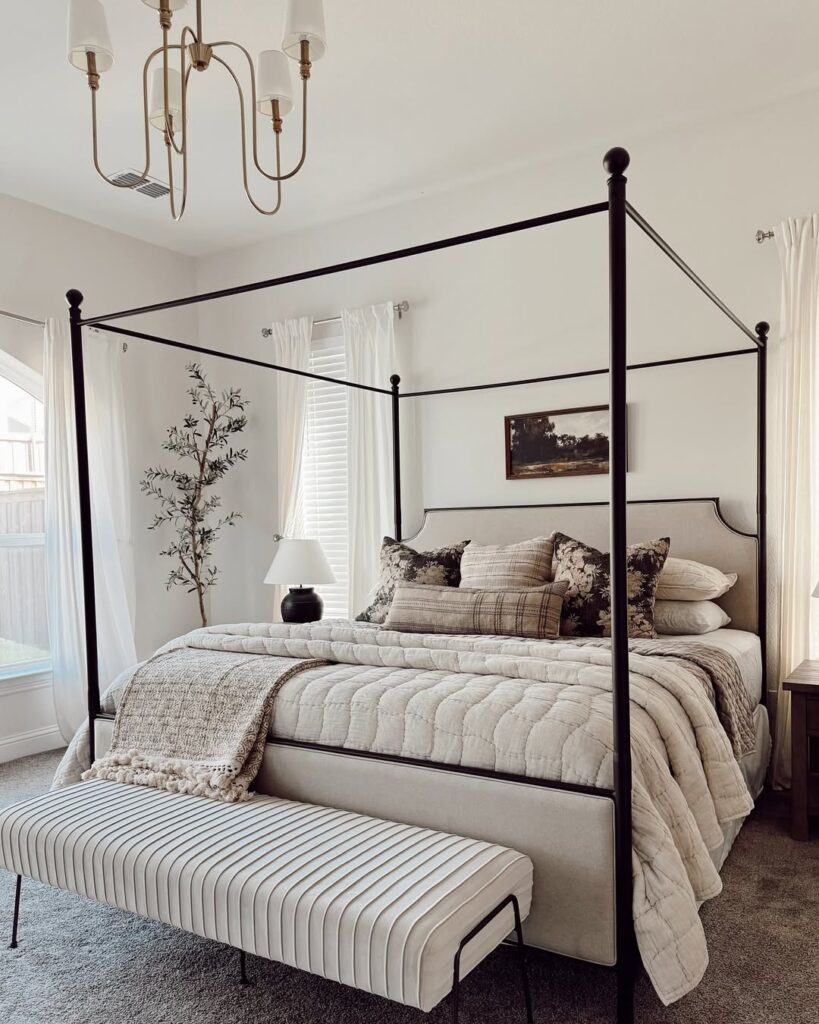 Neutral layers around a canopy bed