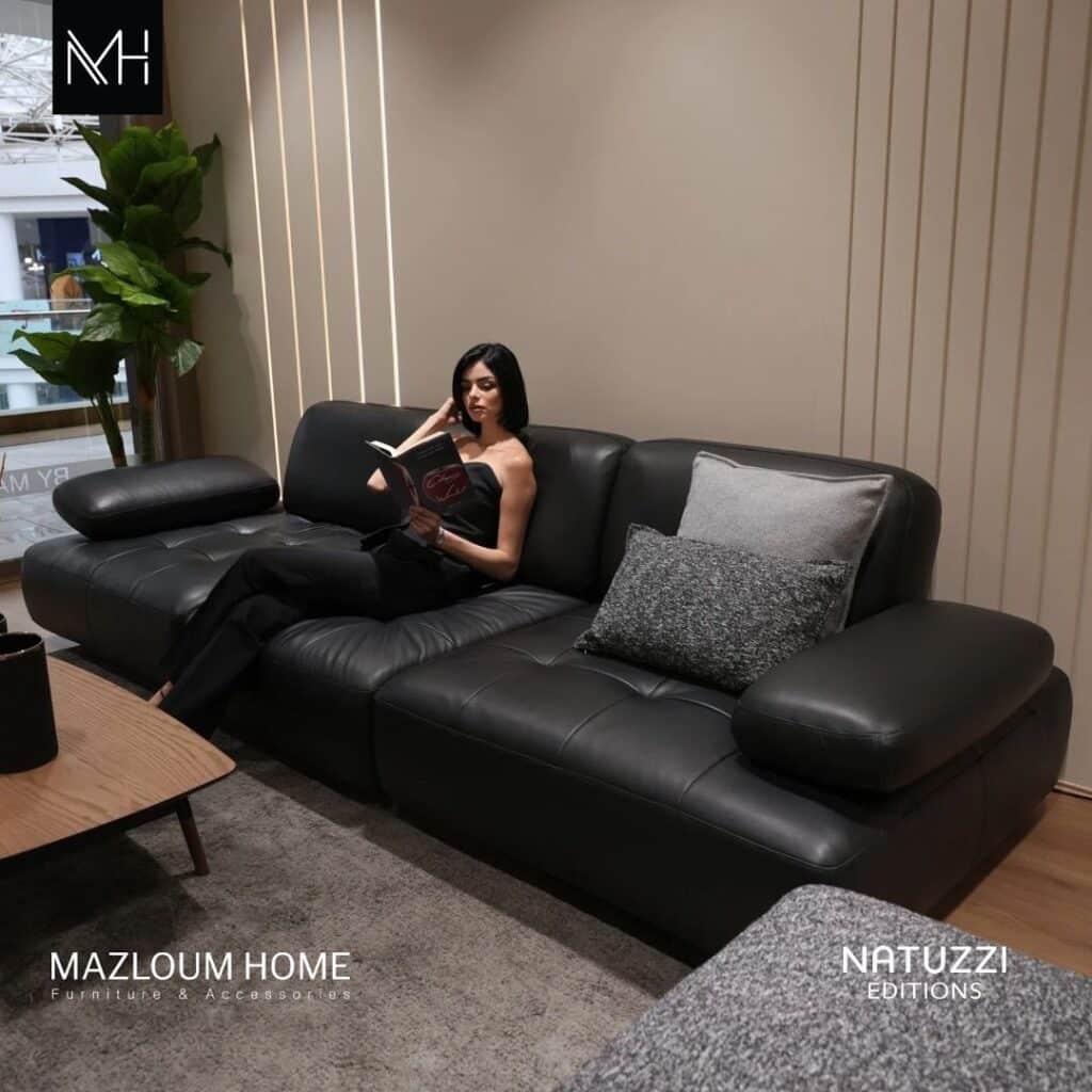 Oversized Black Sofa Anchoring a Sleek Luxury Lounge
