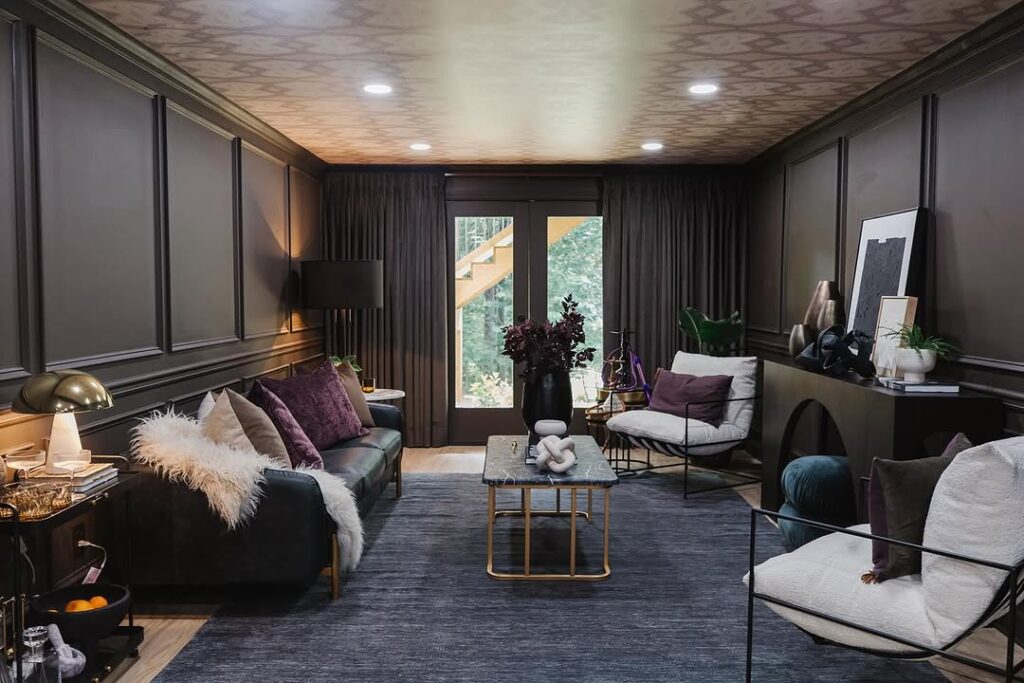 Plum-accented lounge with charcoal paneling