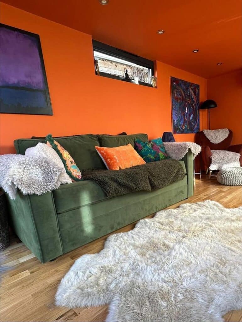 Pumpkin Walls and Forest Green Sofa