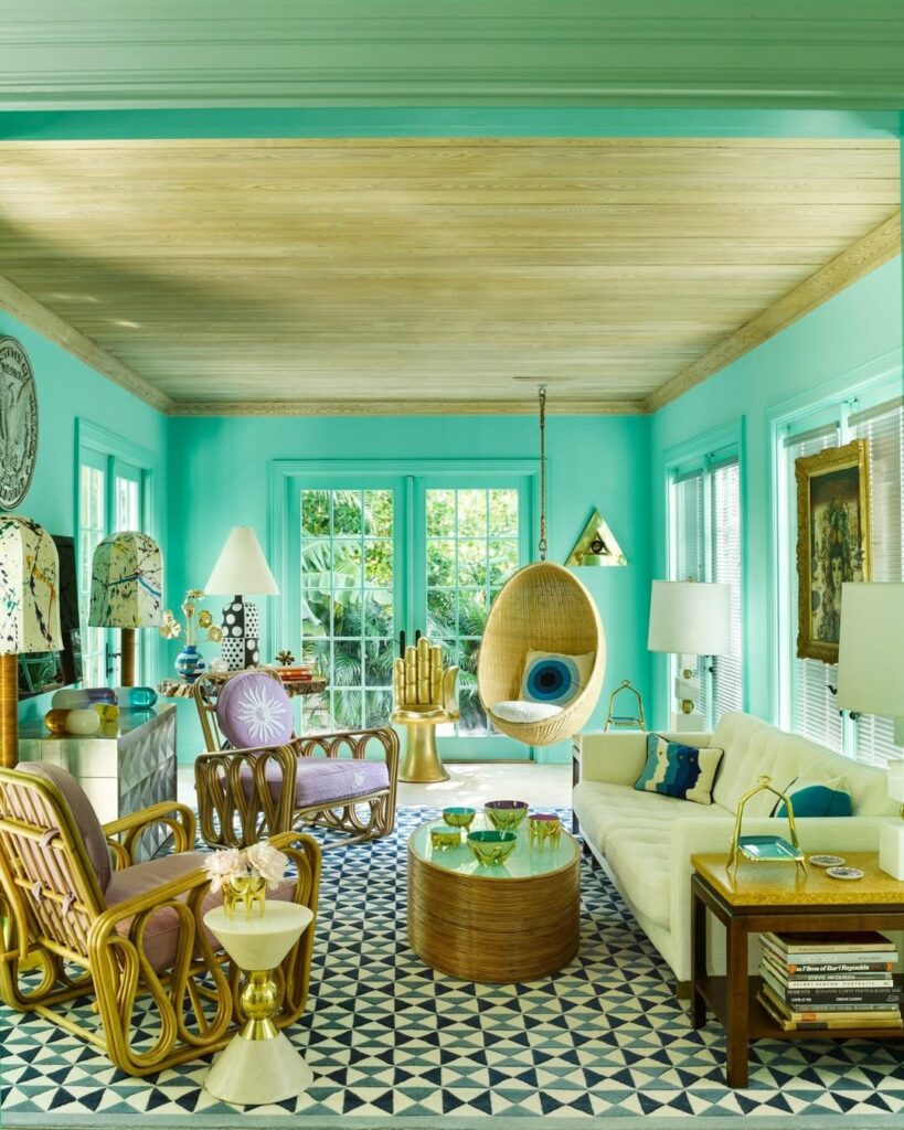 Rattan Accents in a Turquoise Palm Beach Lounge