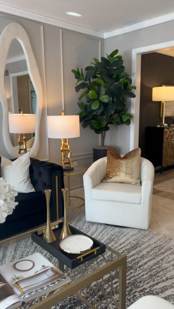 Sculpted Mirror on a Paneled Wall
