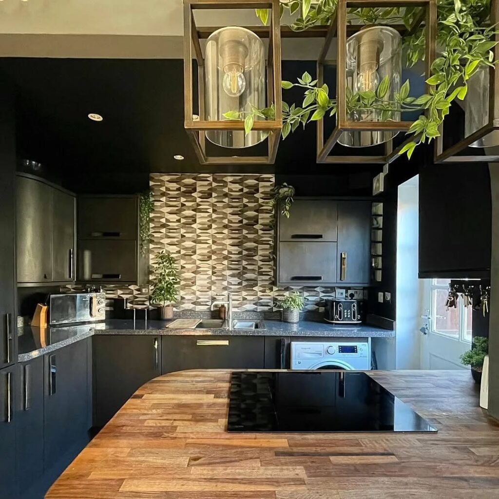 Shadowed Gothic Kitchen with Emerald Accents