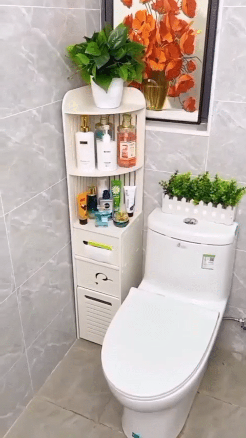 Slim curved cabinet by the toilet