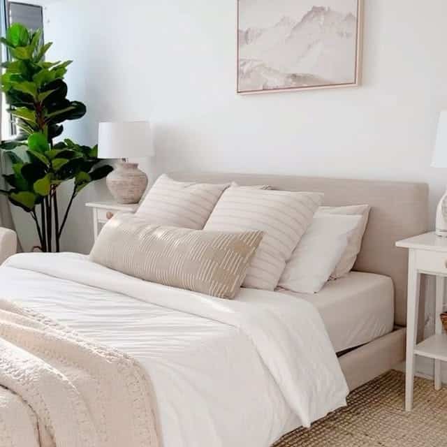 Soft Stripes and Coastal Texture in a Minimal Neutral Bedroom