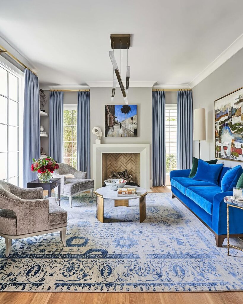 Soft White Surroundings with a Vibrant Sapphire Sofa