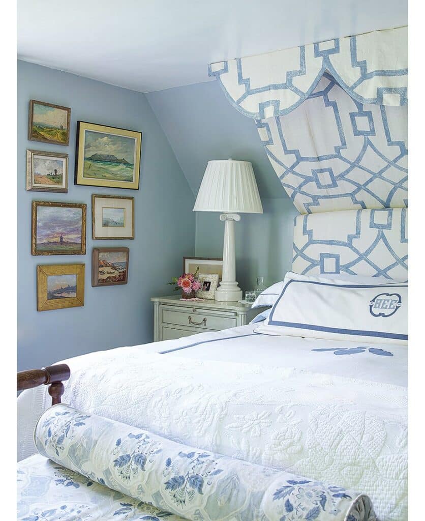 Southern-Inspired Blue Bedroom Design Beneath a Sloped Ceiling