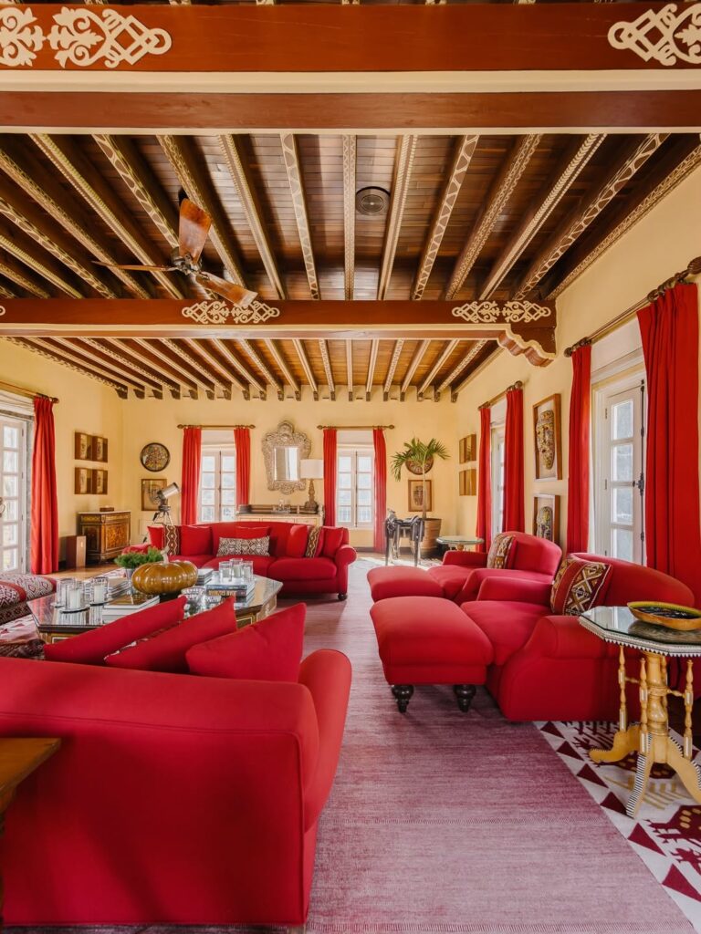 Spanish Revival Living Room with a Red Beam