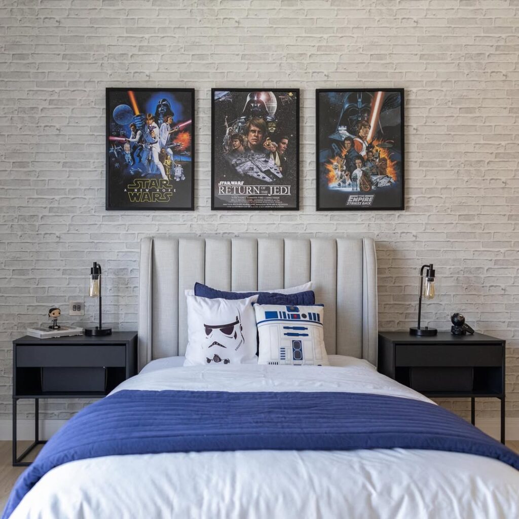 Three Star Wars Posters on White Brick