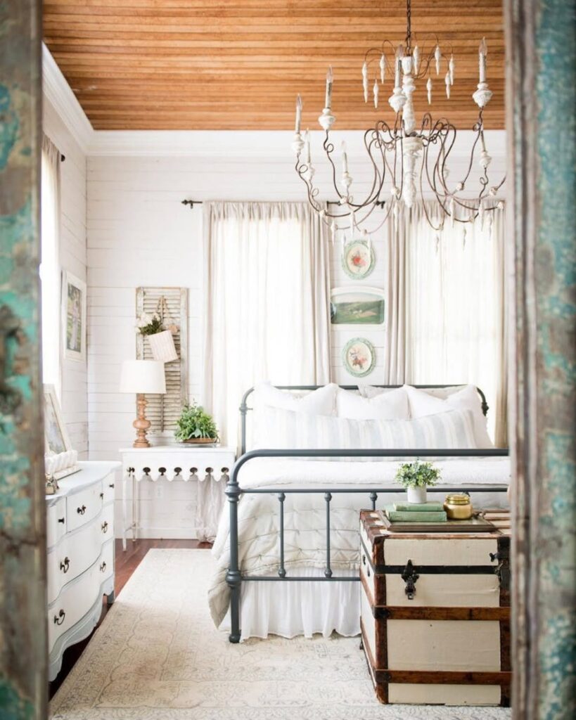 Vintage Bedroom with Trunk and Chandelier