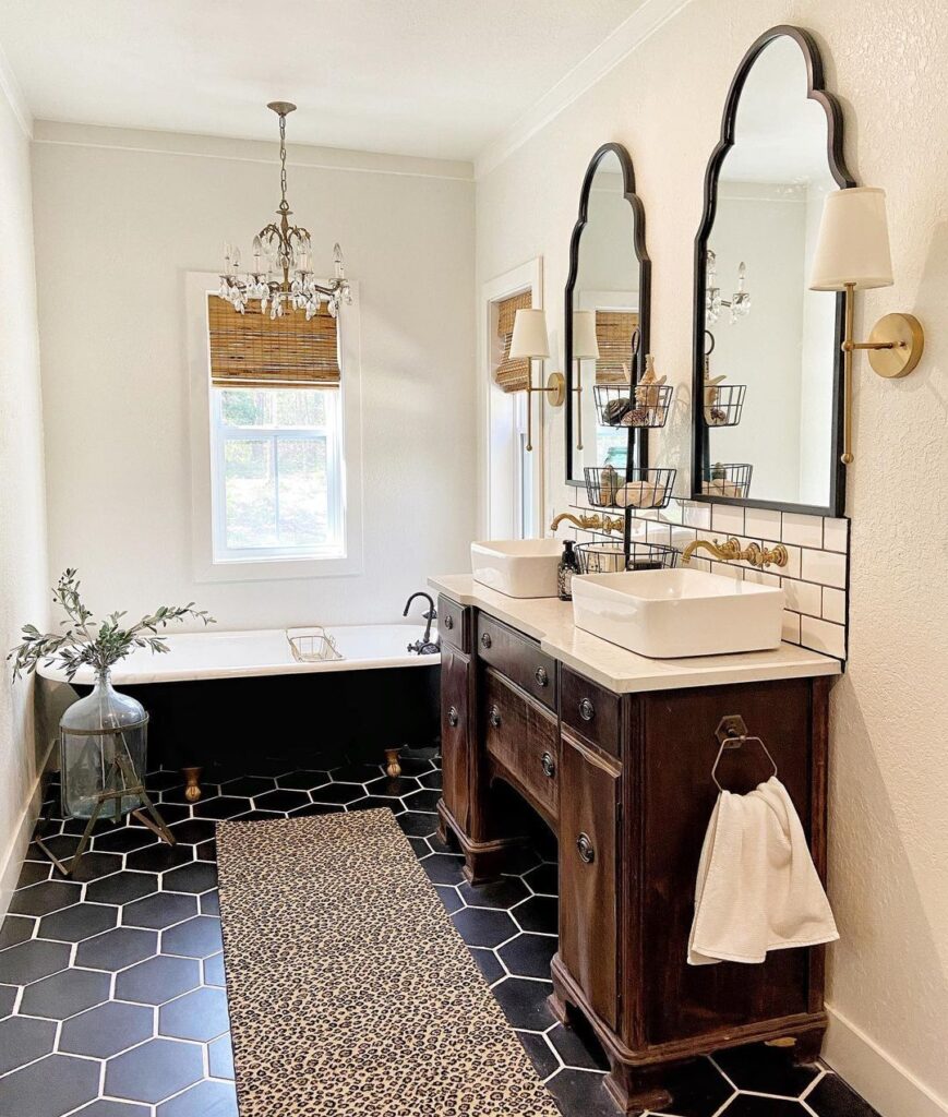 Vintage Rich Walnut Vanity and Hexagonal Tile in a Farmhouse Bathroom