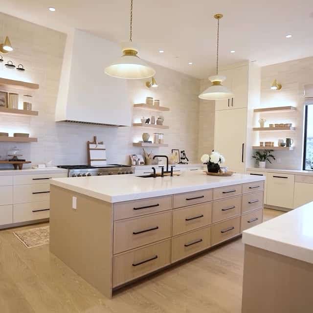 Warmly Lit Minimalist Kitchen with Soft Beige Cabinetry